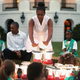 First lady Michelle Obama pretends to warm herself over a “fire” made from battery-powered lanterns as she and President Barack Obama host a group of Girl Scouts from across the country for a campout on the South Lawn of the White House June 30, 2015, in Washington, D.C.
Chip Somodevilla/Getty Images